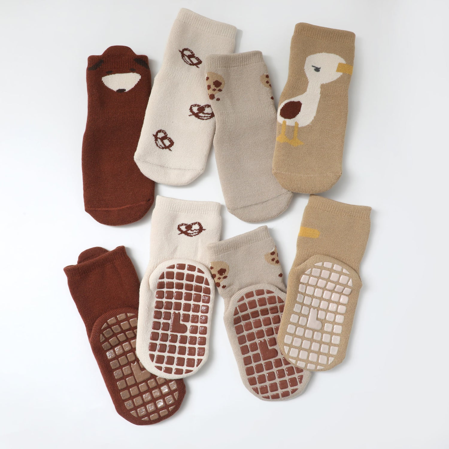 Specialized baby socks featuring non-slip ankle grips to ensure stability and comfort.