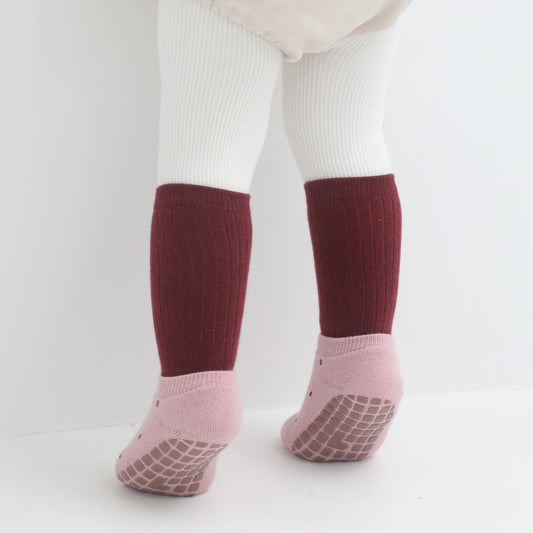 How can I ensure my toddler's socks stay on throughout the day?