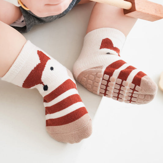 Is it safe for babies to wear grip socks while sleeping?