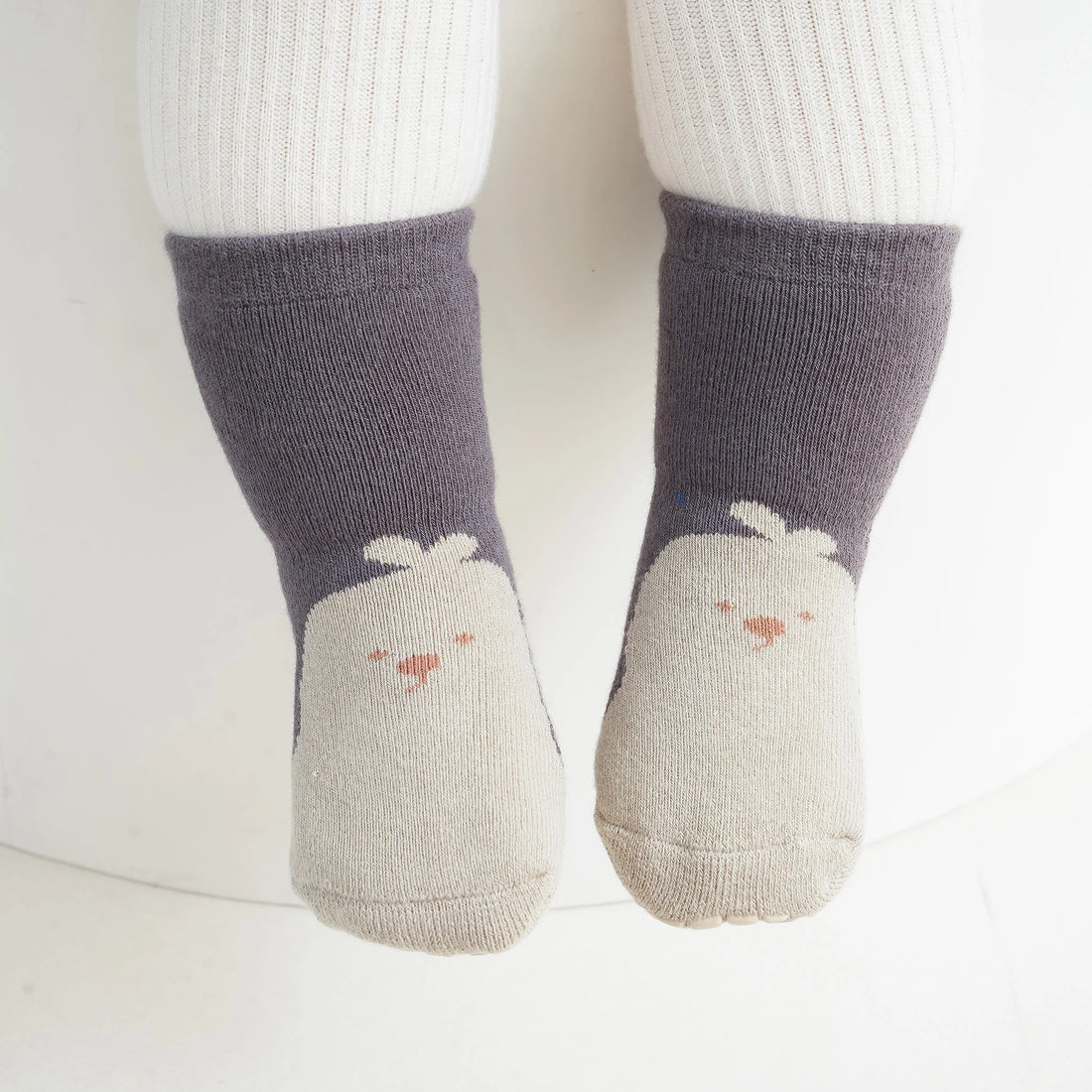 How do you shrink grip socks?
