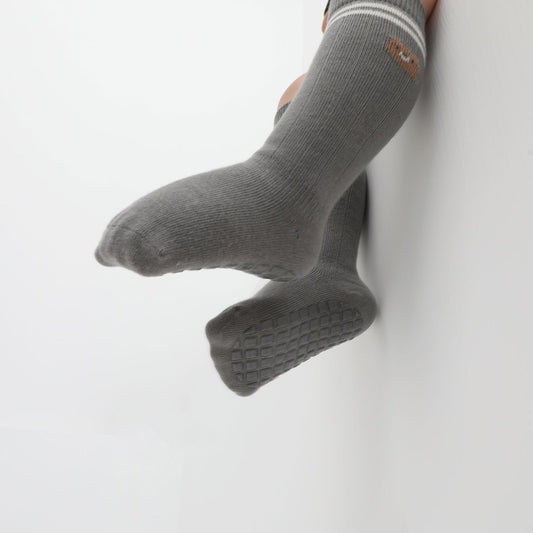 Ensuring non-slip socks stay on infants?