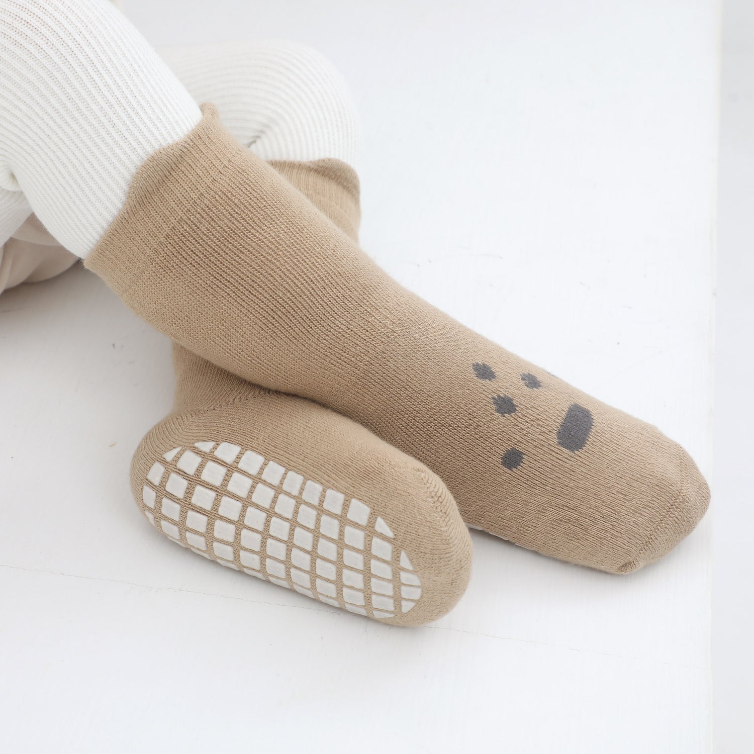 Bright, fun toddler grip socks ensuring safety.