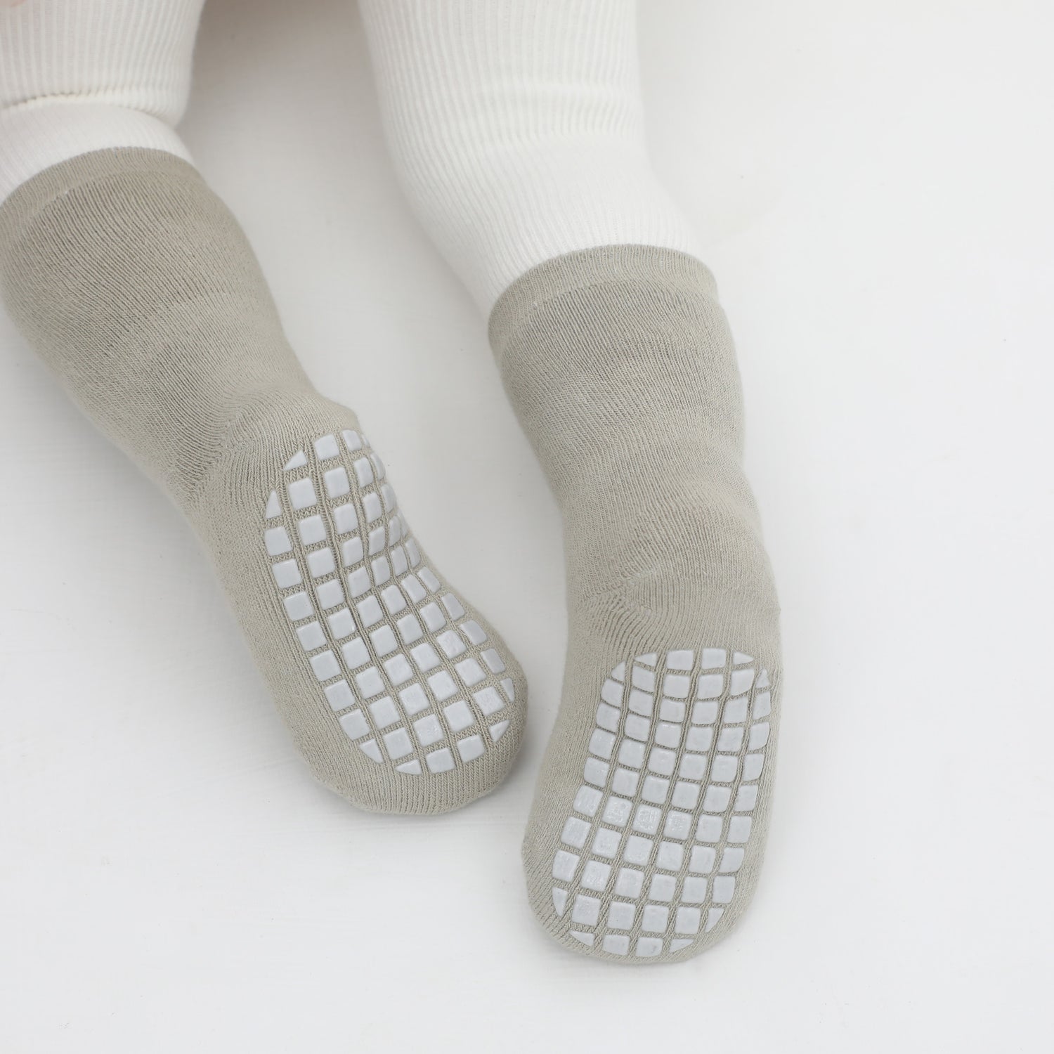 Infant boy's grip socks for both safety and fun.