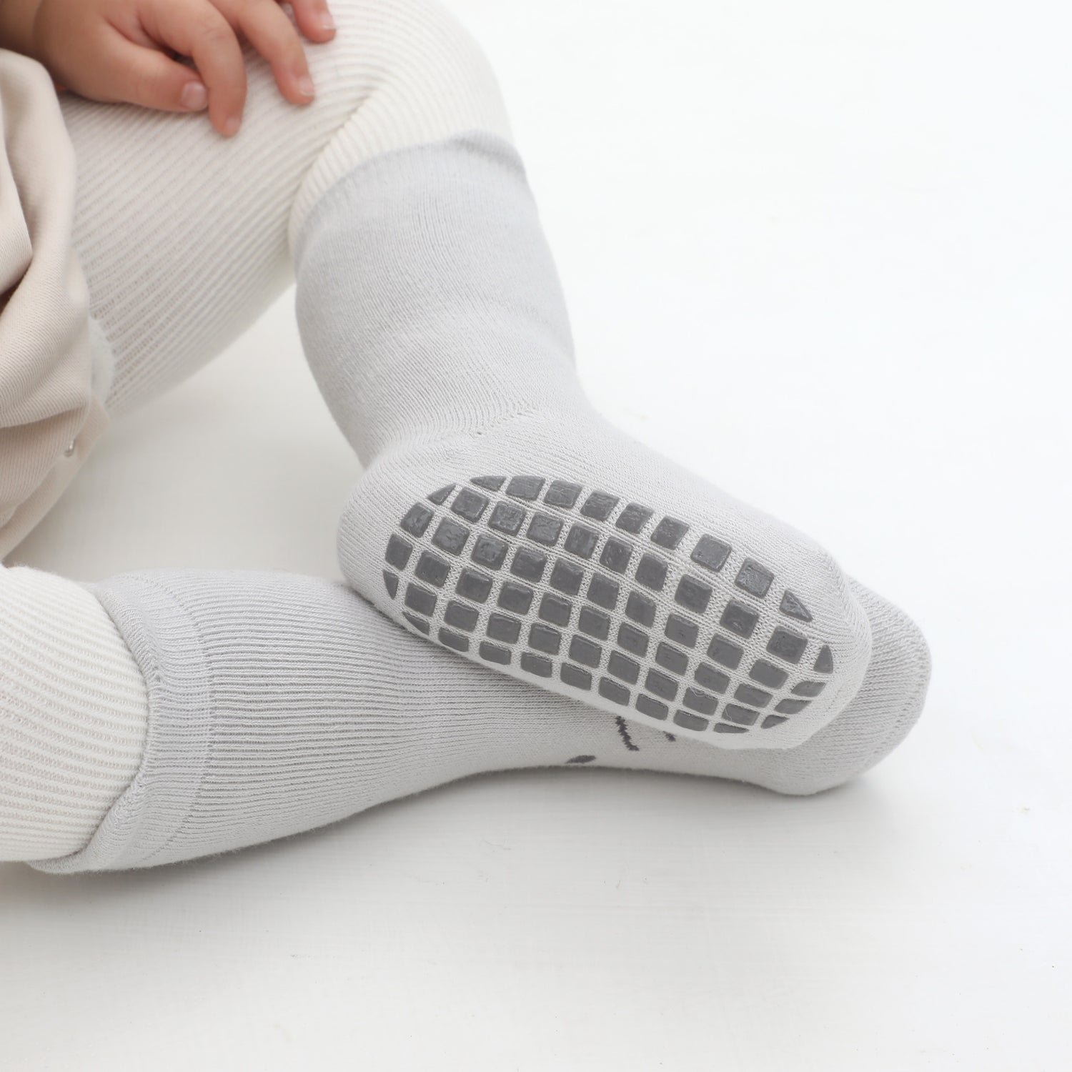 Fun grips on colorful kids' socks make for exciting and safe indoor adventures.