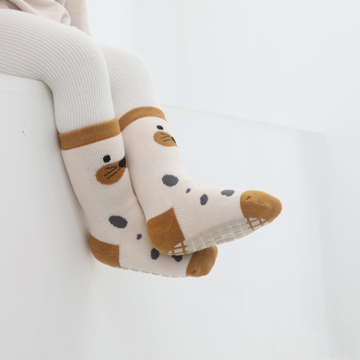 Secure-fit ankle socks with added grips, designed for the active baby on the move.