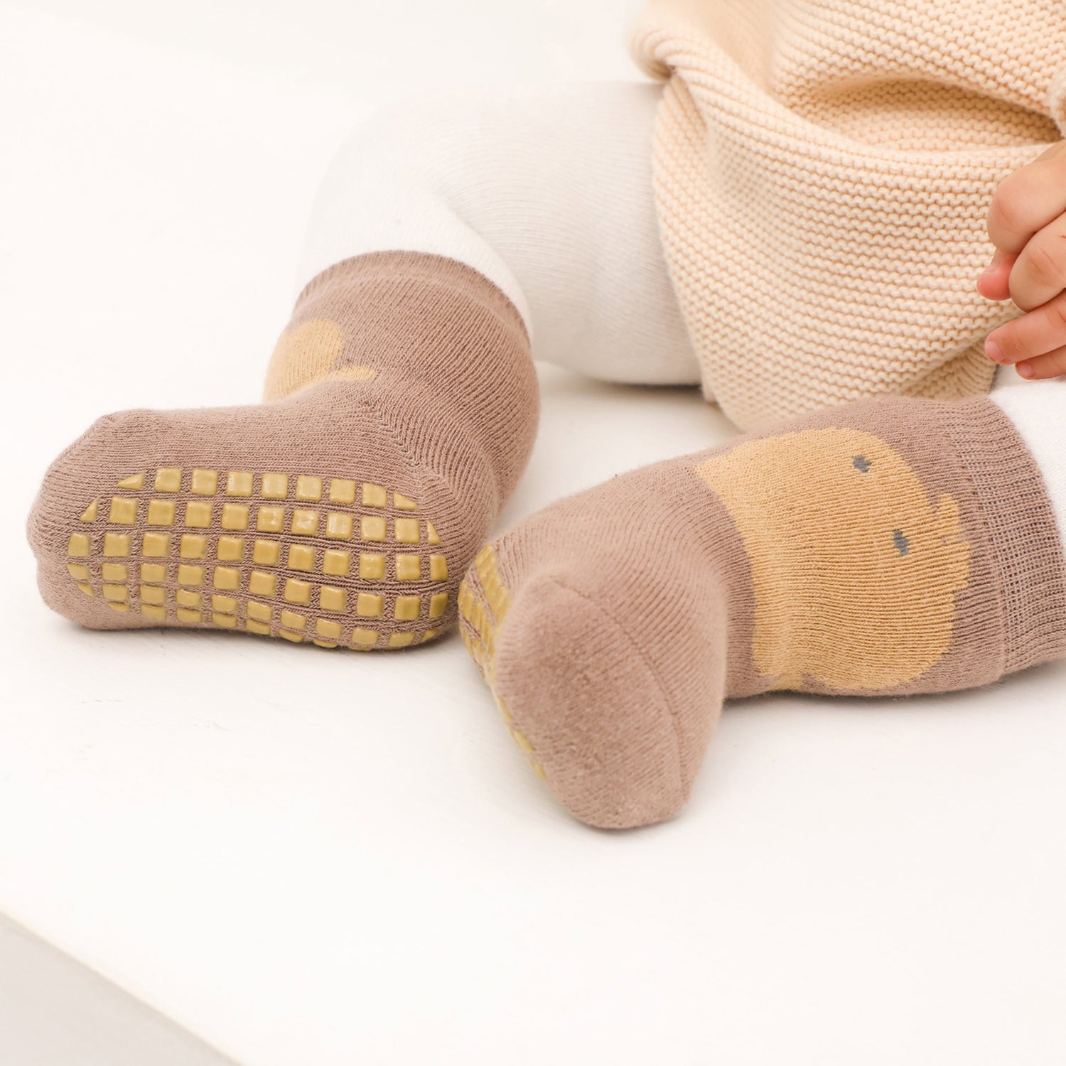 A variety of hues in non-slip baby socks, providing safety in every step and color for every outfit.