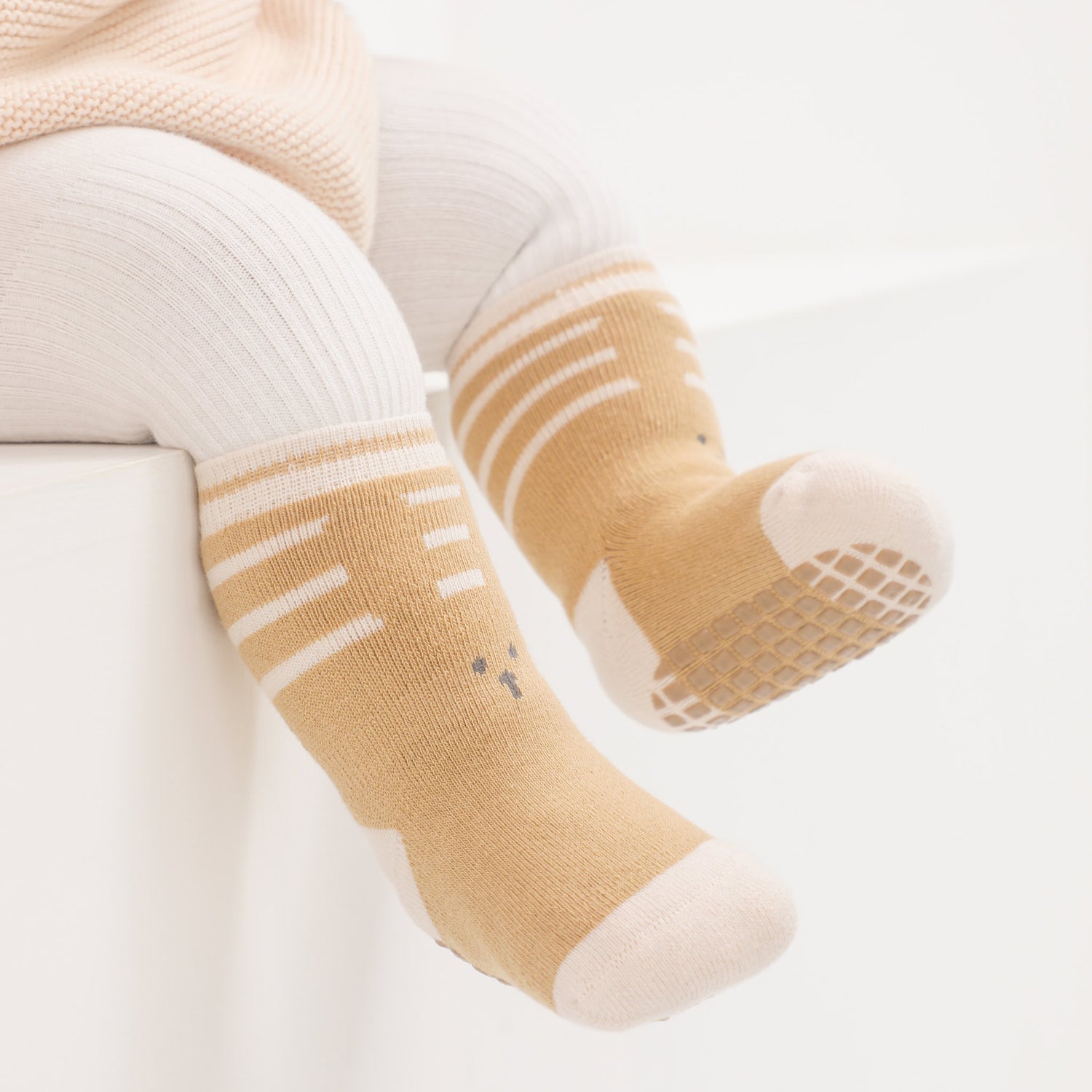 Baby socks with reinforced stay-on loops for easy dressing