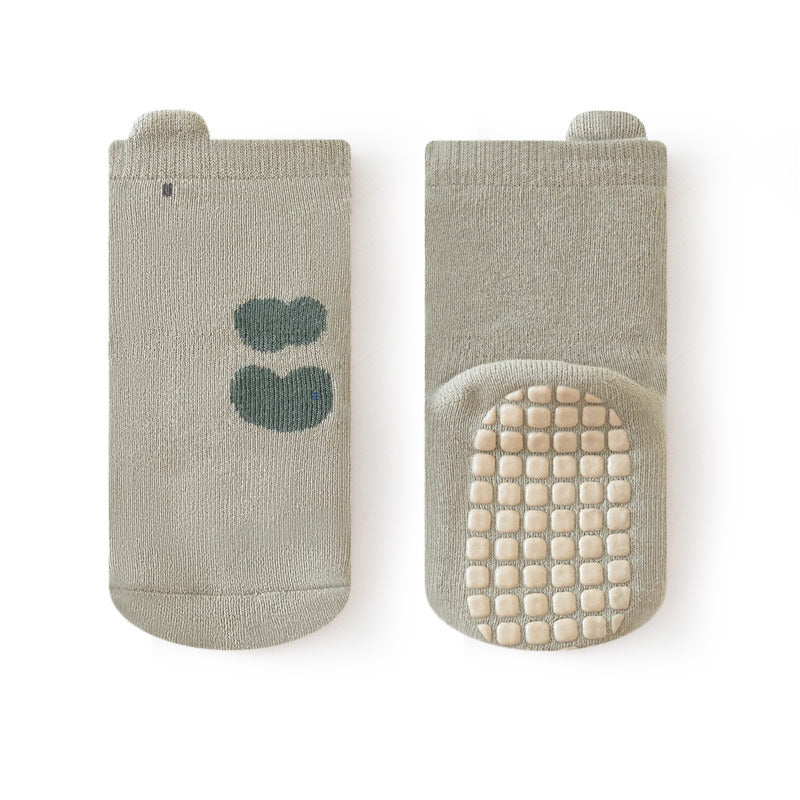 Baby socks that stay on with adjustable strap closures